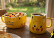 Pokémon Frühstücksset Pikachu mit Kaffee in der Tasse und Müsli in der Schale