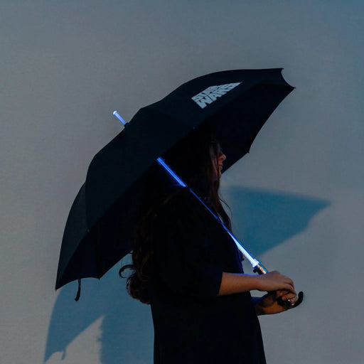 Black umbrella canopy with glowing blue lightsaber-shaped handle