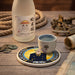 One Piece ceramic coaster with Sanji design, front view